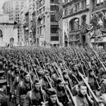 The 1st or Famous Lost Battalion, 308th Infantry. 77th Division, after passing through the Victory Arch on Fifth Avenue, New York, in recent parade - New York Times May 11, 1919
